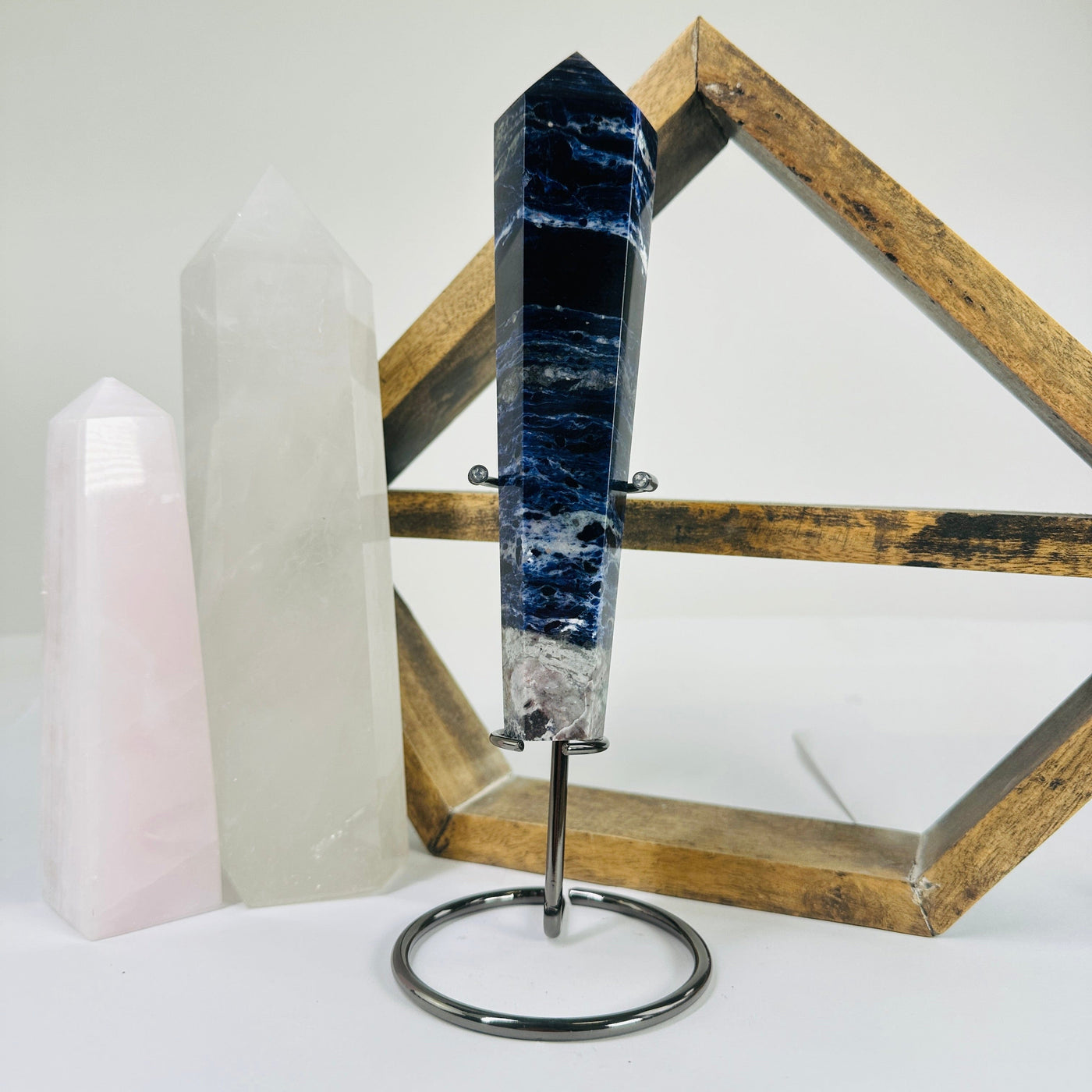 sodalite on stand with decorations in the background