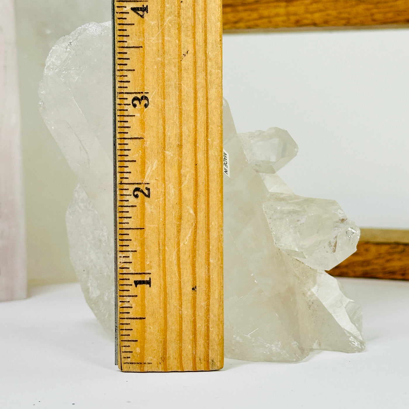 crystal quartz with decorations in the background