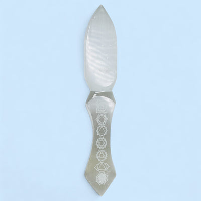  Etched Selenite Crystal Knife front view with a blue background.