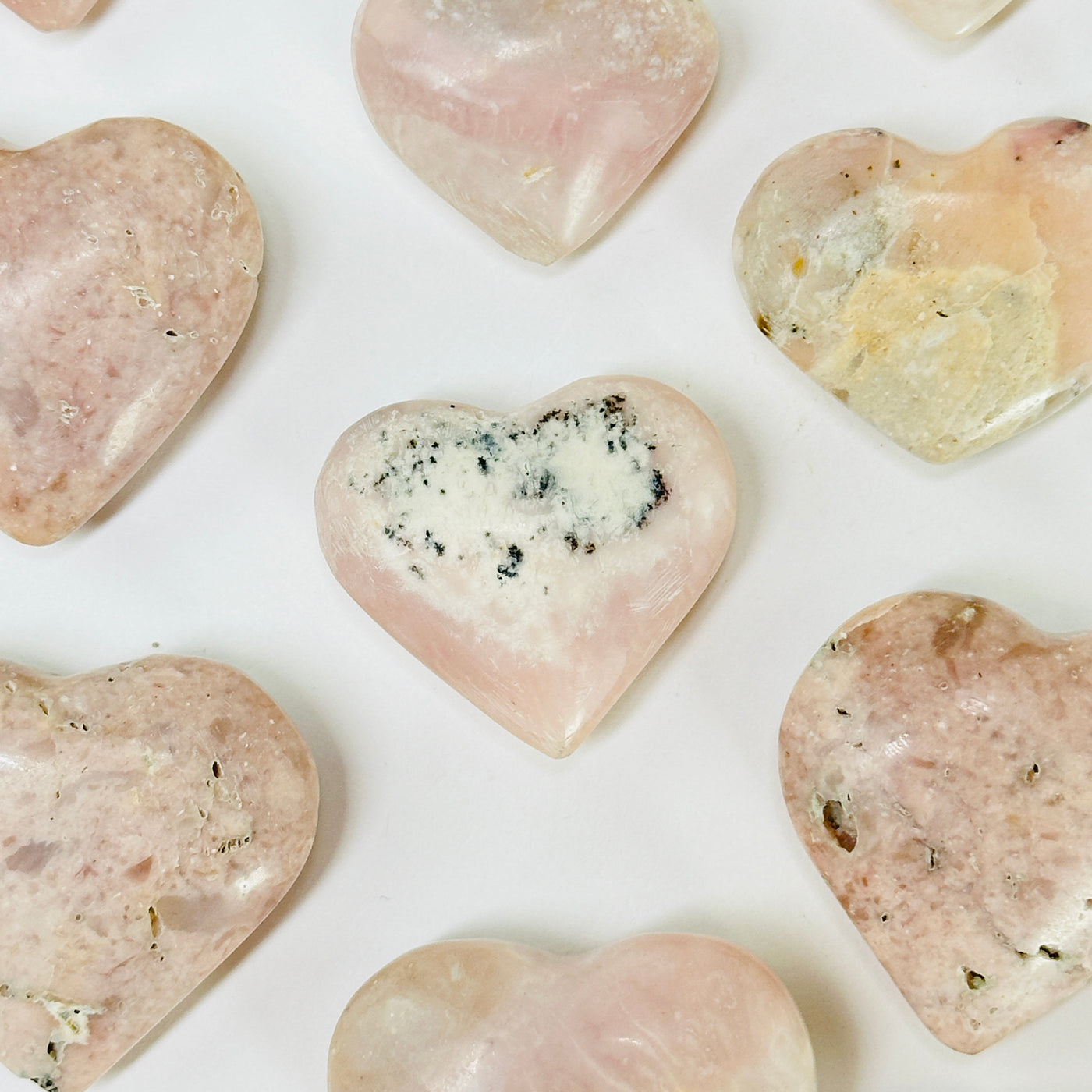 pink opal hearts with decorations in the background