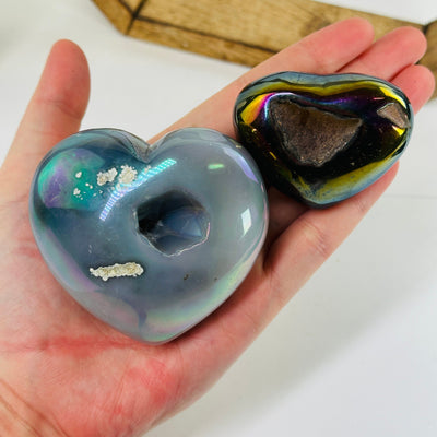 aura agate hearts with decorations in the background