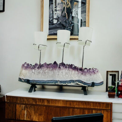 amethyst candle holder with decorations in the background