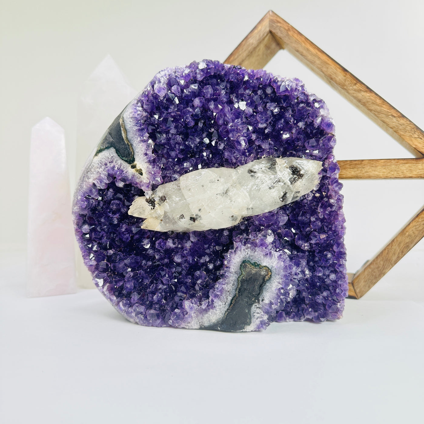 amethyst cut base with decorations in the background