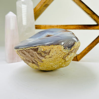 agate geode with decorations in the background