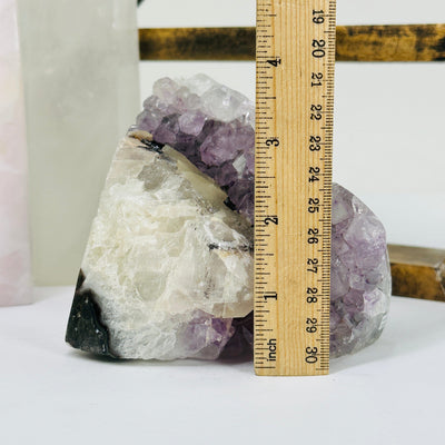 amethyst cut base next to a ruler for size reference