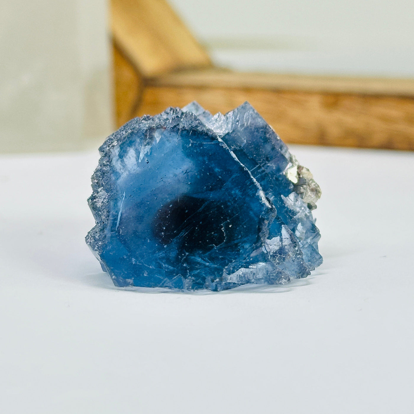 blue fluorite with decorations in the background