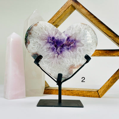 amethyst HEART with decorations in the background