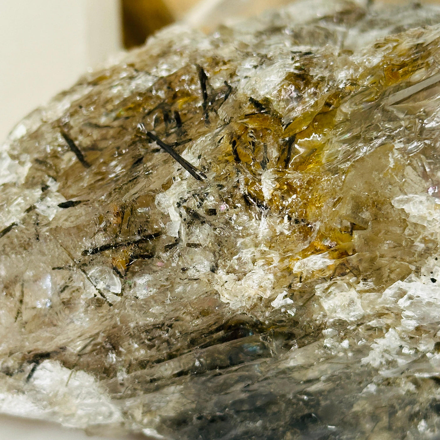 rutile quartz with decorations in the background