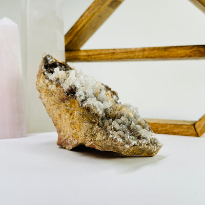 calcite with decorations in the background