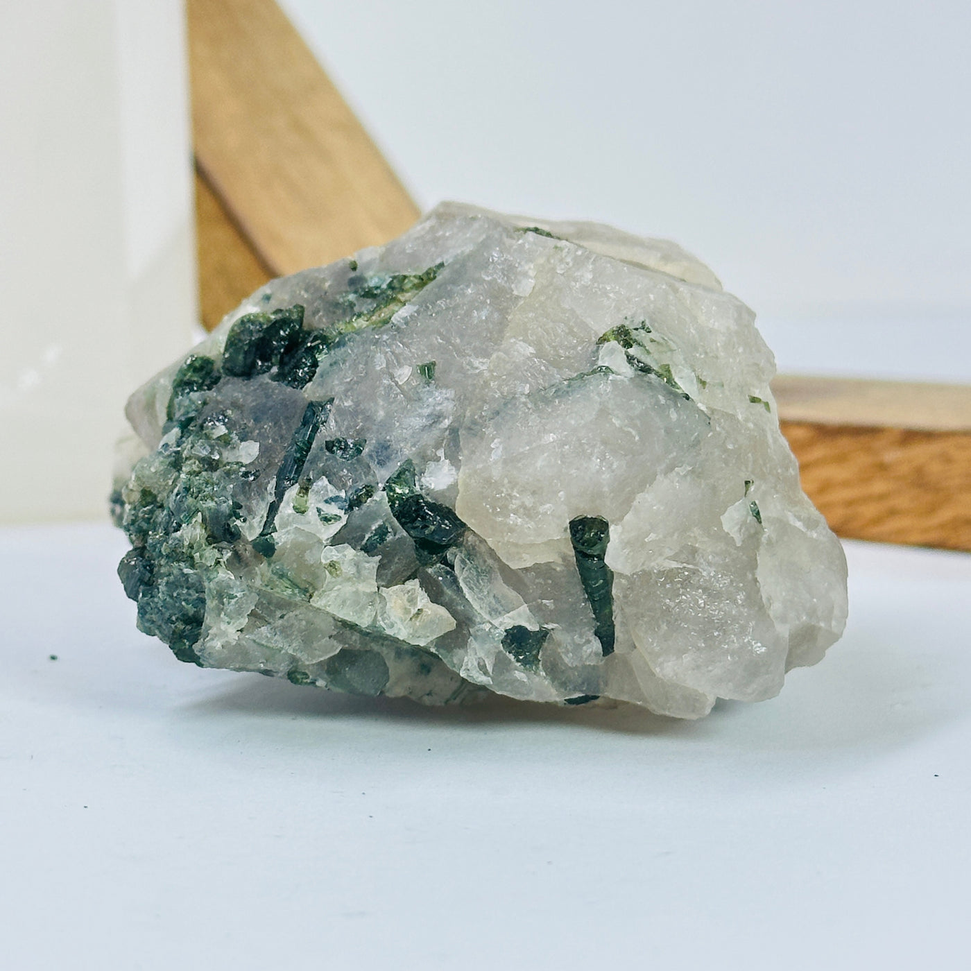 tourmaline with decorations in the background