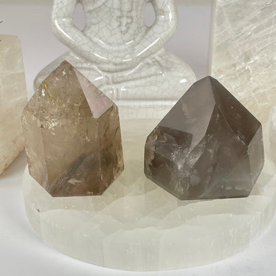 Crystal Quartz Point with Phantoms - You Choose #1 both variants front view with props in the background