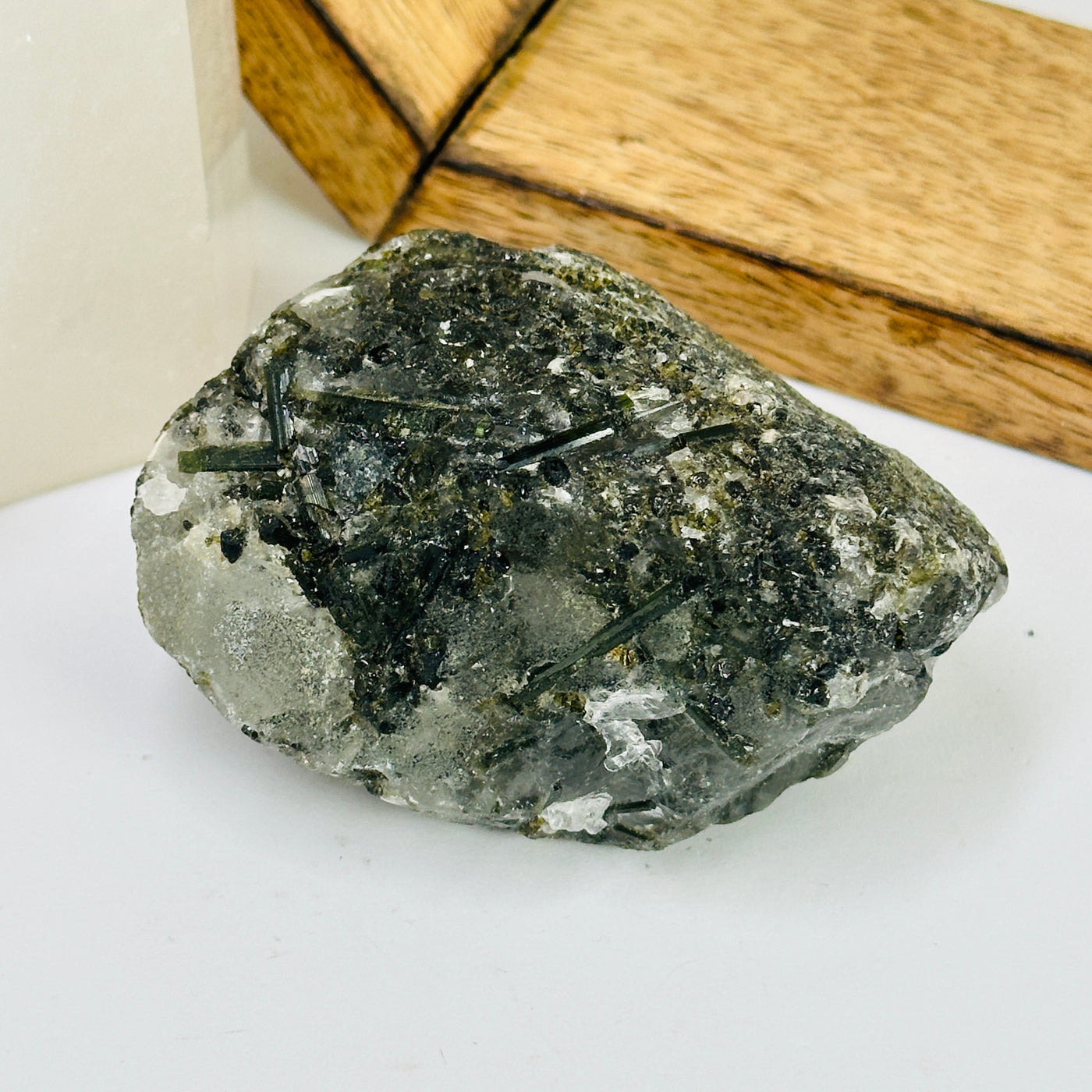 tourmaline with decorations in the background