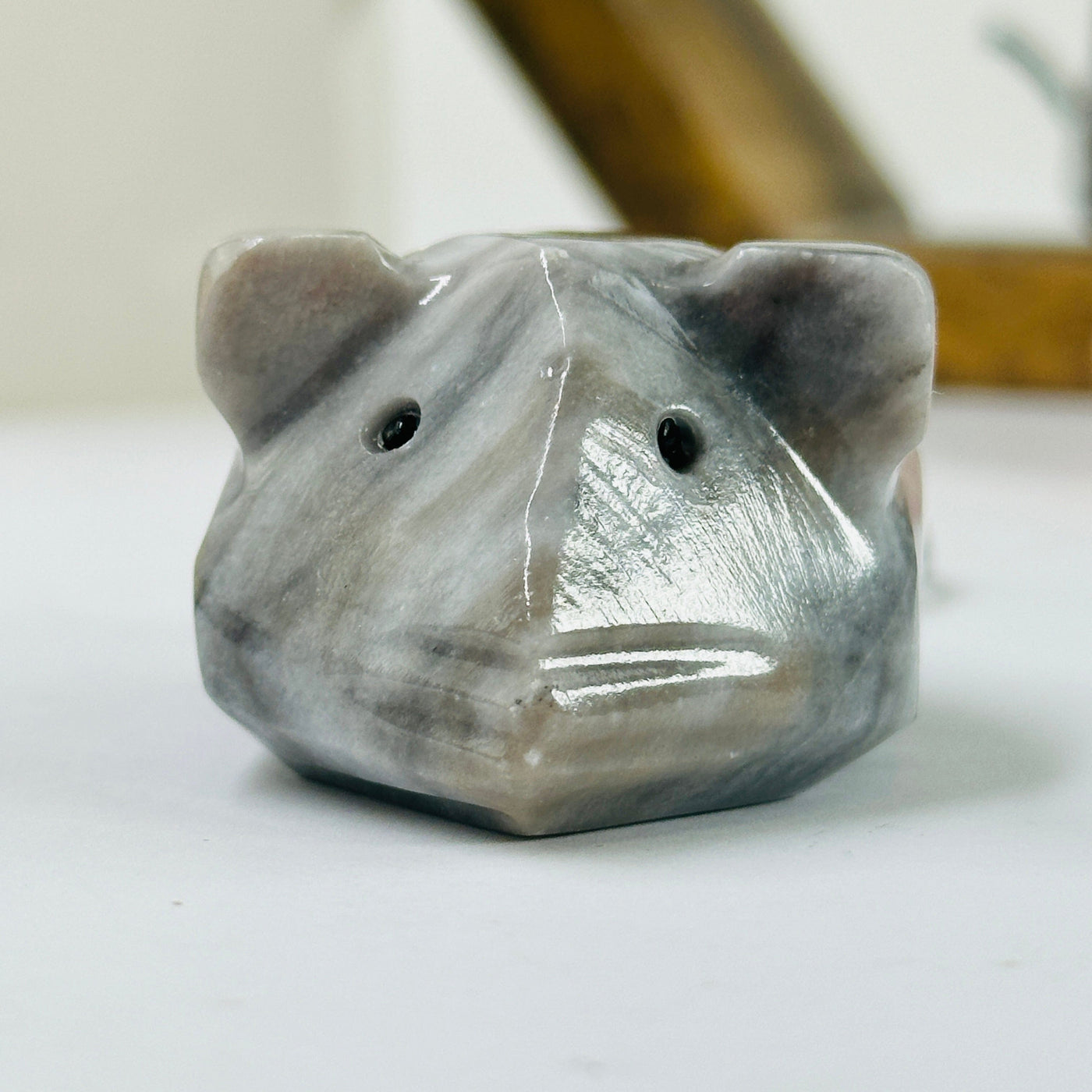 Mexican onyx mouse with decorations in the background