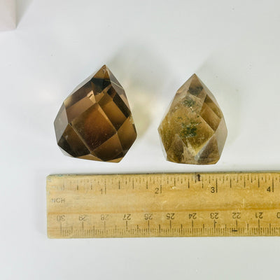 lodalite points next to a ruler for size reference