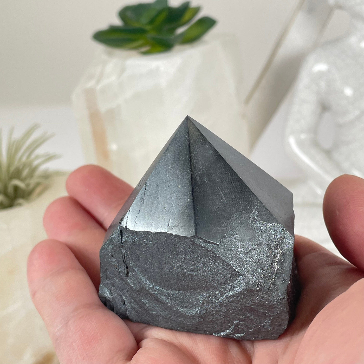  Hematite Semi Polished Crystal Point in hand for size reference