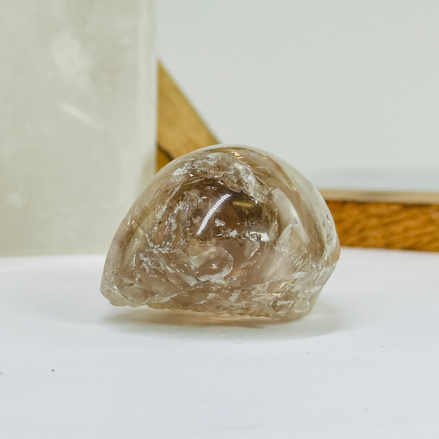 smokey quartz with decorations in the background