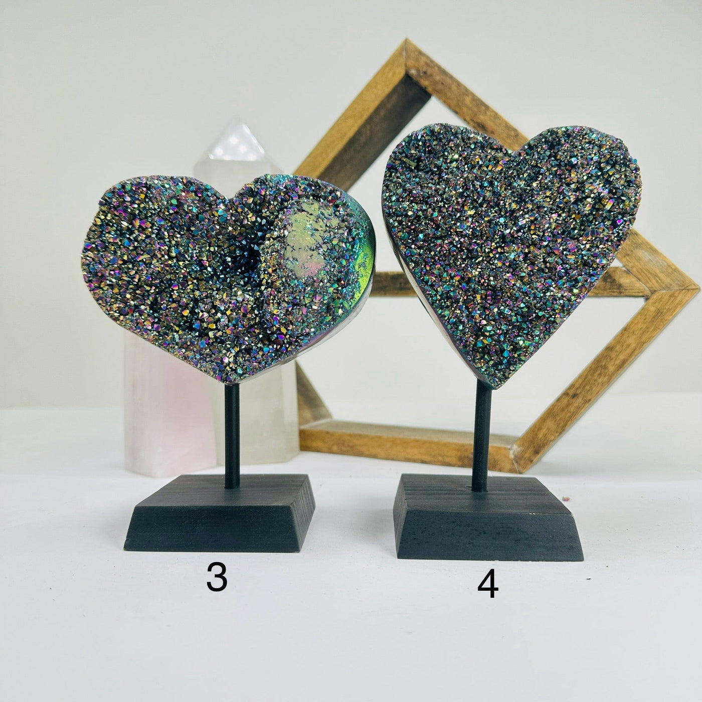 titanium coated heart on stand with decorations in the background