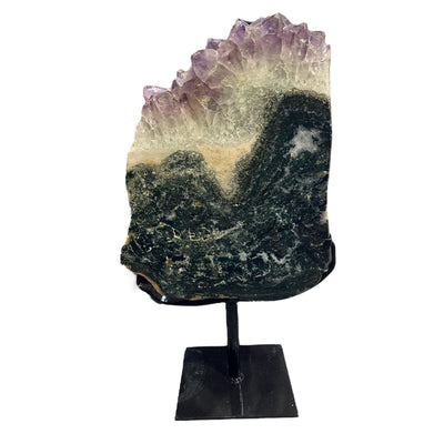 amethyst with jasper on metal stand on white background