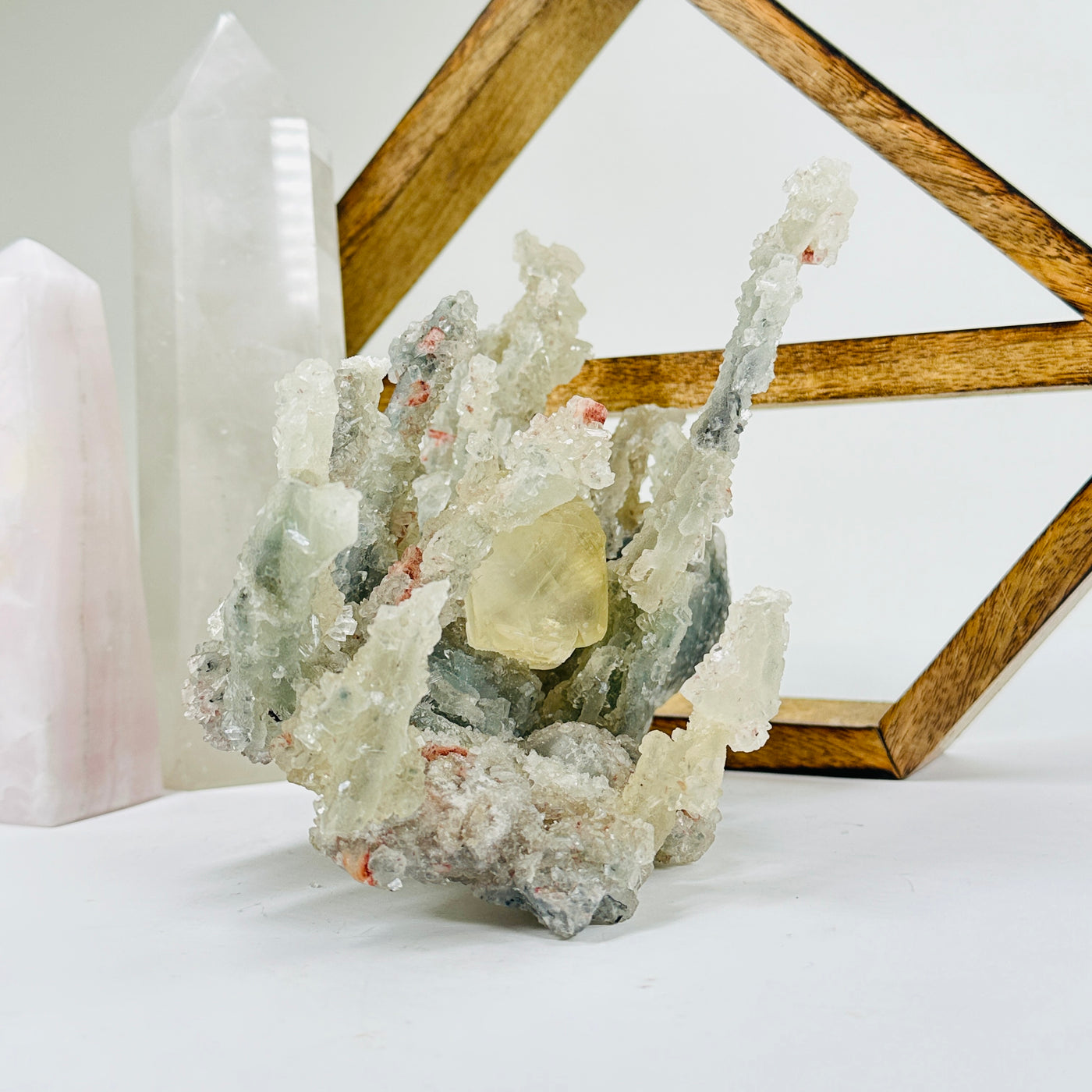 apophyllite with decorations in the background