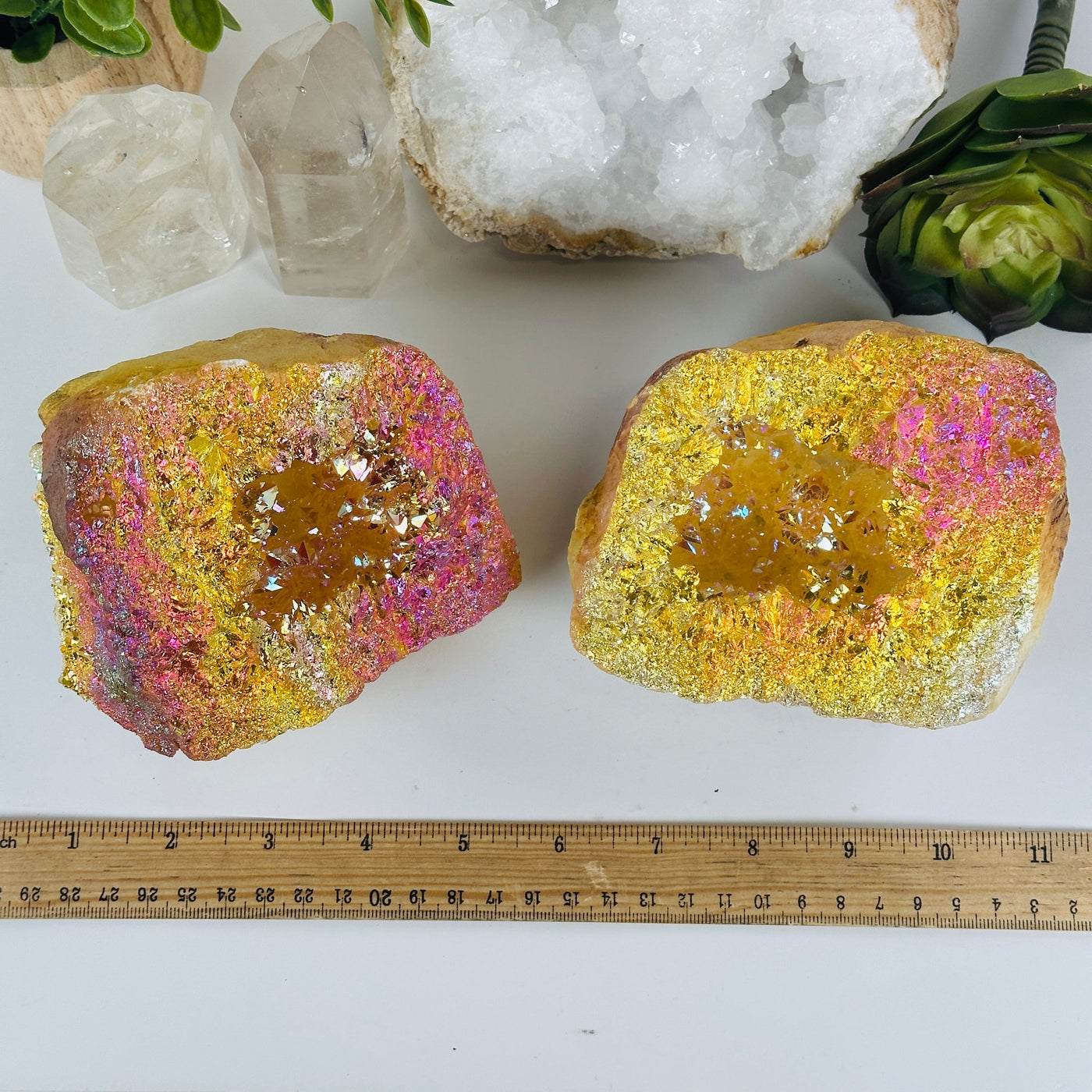 Sunshine Aura Quartz Crystal Geode Pair with ruler for size reference
