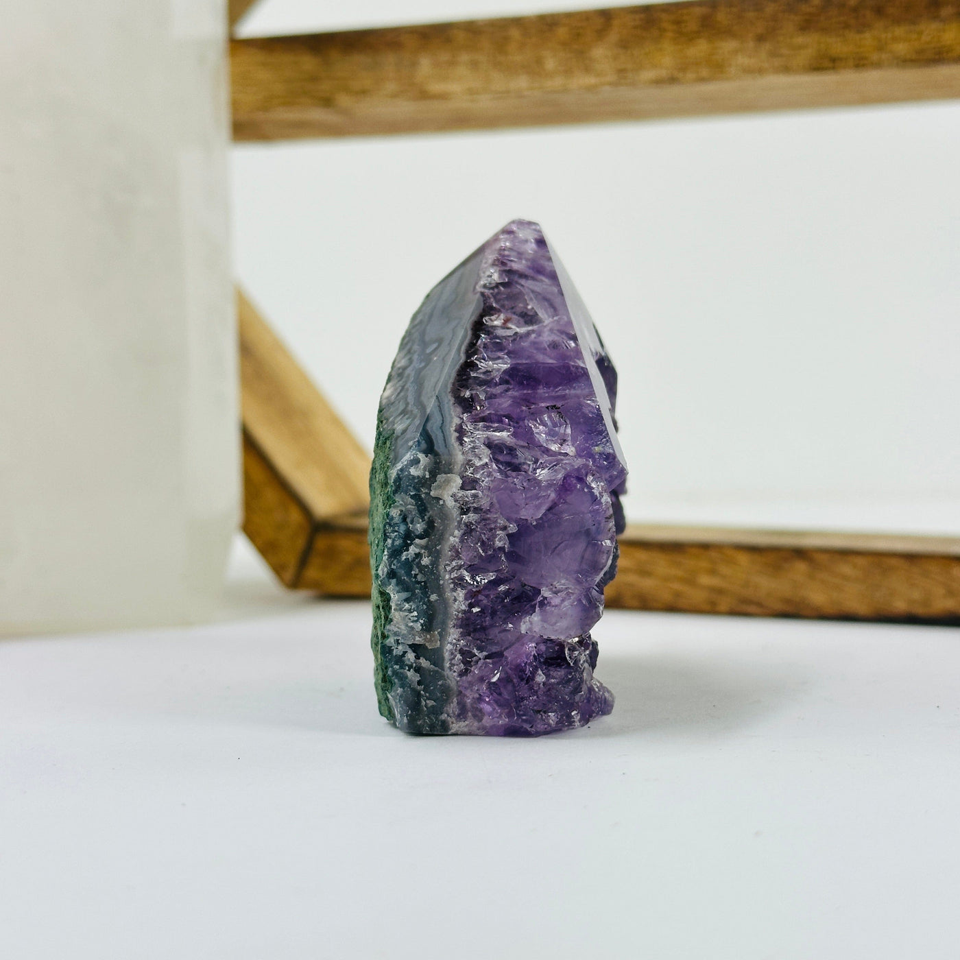 amethyst points with decorations in the background