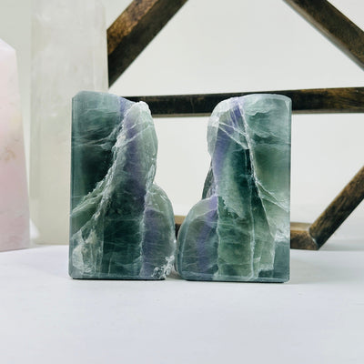 fluorite bookends with decorations in the background