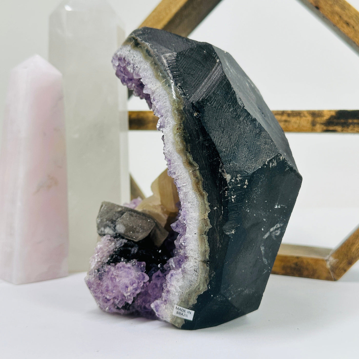 amethyst cut base with decorations in the background