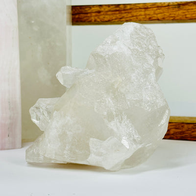 crystal quartz with decorations in the background