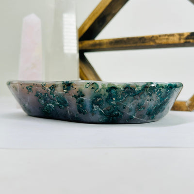 amethyst bowl with decorations in the background