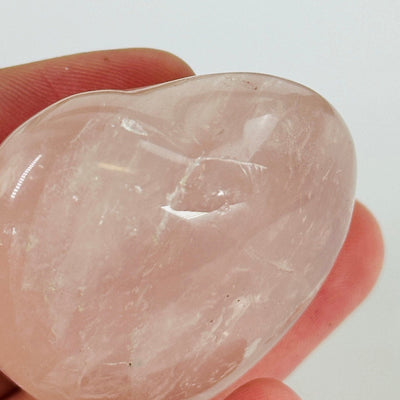 up close shot of chip on rose quartz heart