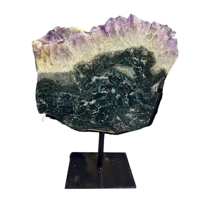 amethyst with jasper on metal stand on white background