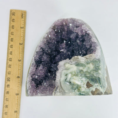 amethyst cut base next to a ruler for size reference