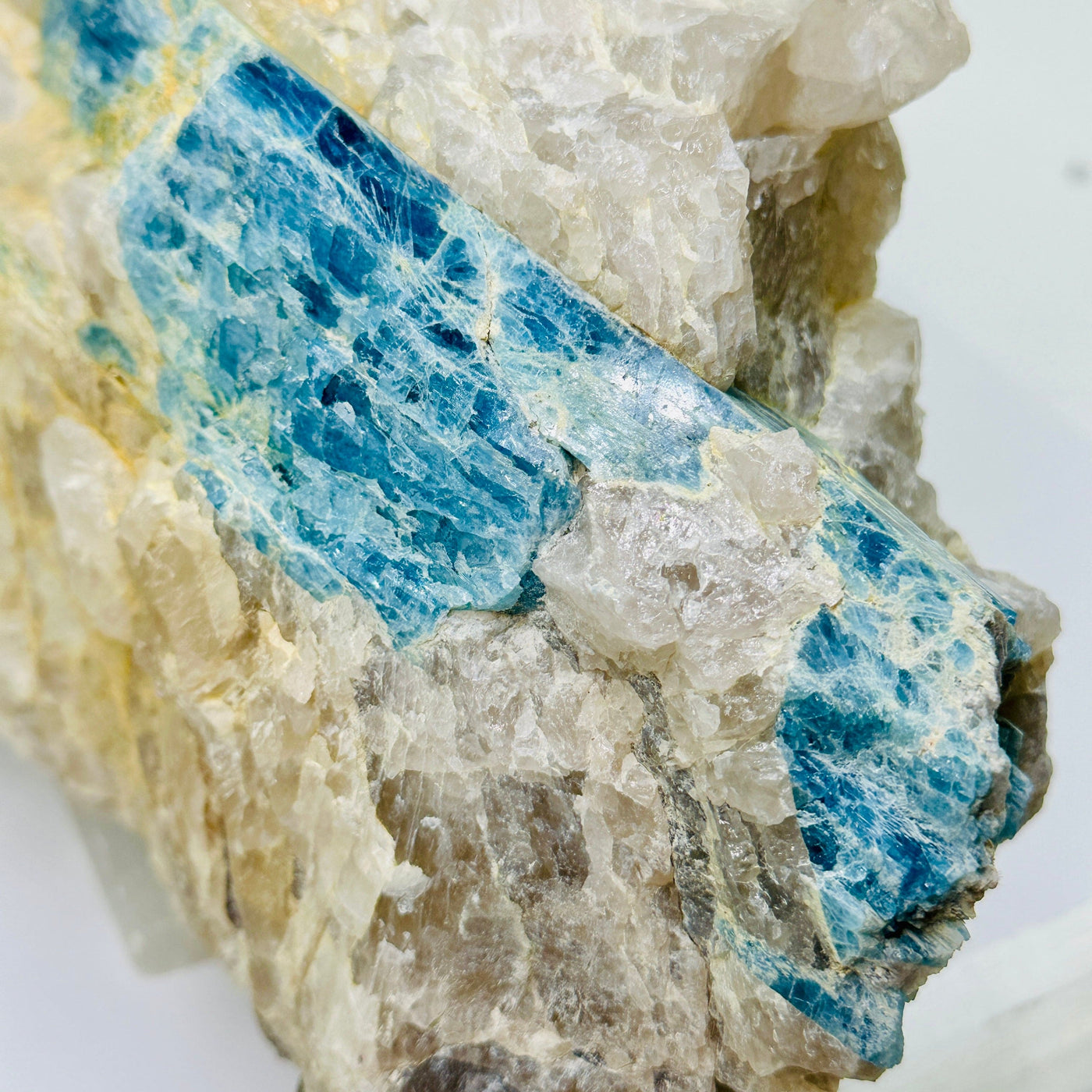 Aquamarine in matrix - giant aquamarine crystal embedded in large natural rough stone close up for detail