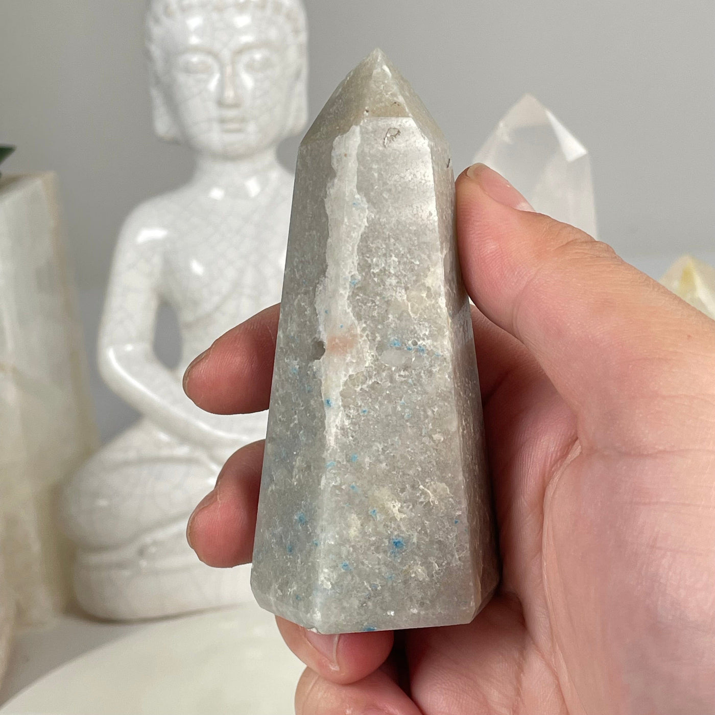 Trolleite Polished Crystal Point #2 in hand for size reference