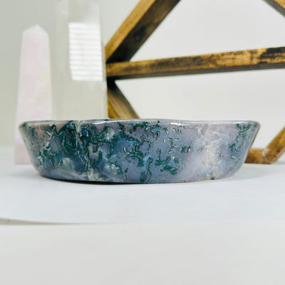 amethyst bowl with decorations in the background