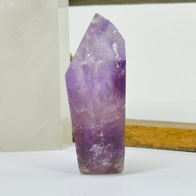 amethyst points with decorations in the background