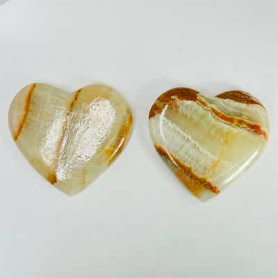 onyx heart with decorations in the background