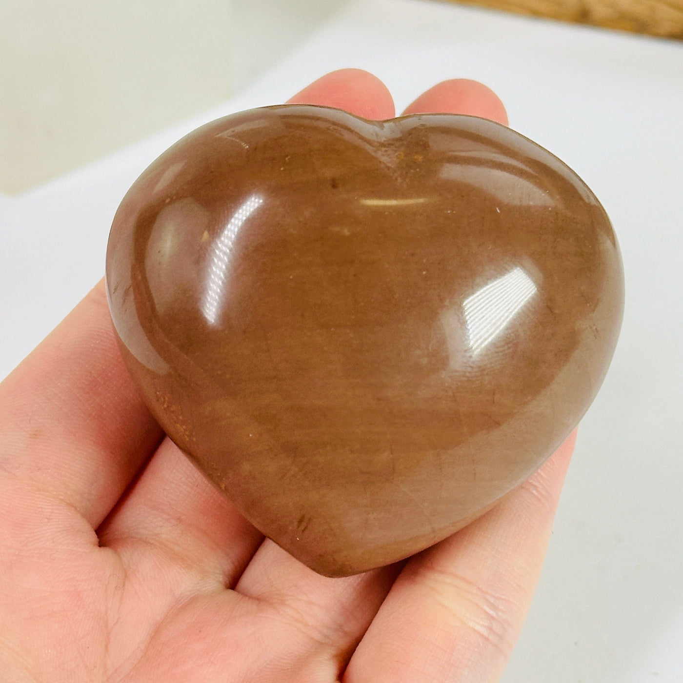 jasper heart with decorations in the background
