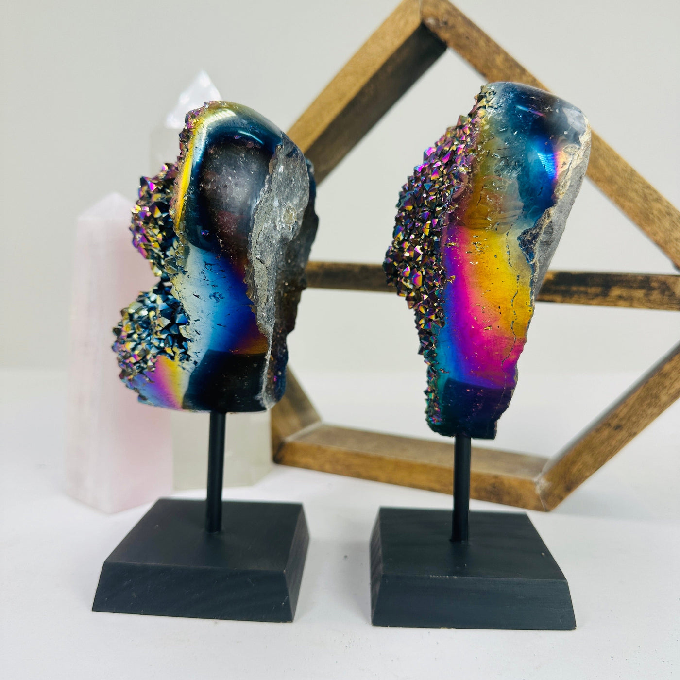 titanium coated heart on stand with decorations in the background