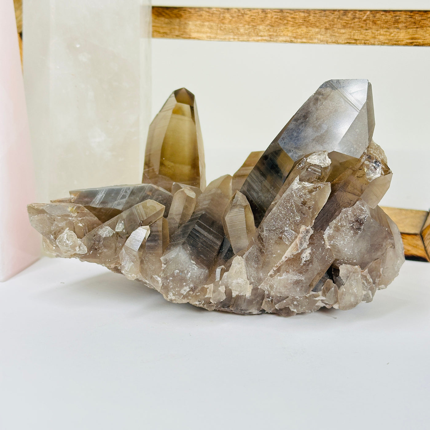 smokey quartz with decorations in  the background