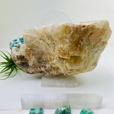 Aquamarine in matrix - giant aquamarine crystal embedded in large natural rough stone back view