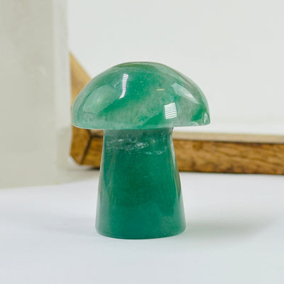 aventurine mushroom with decorations in the background