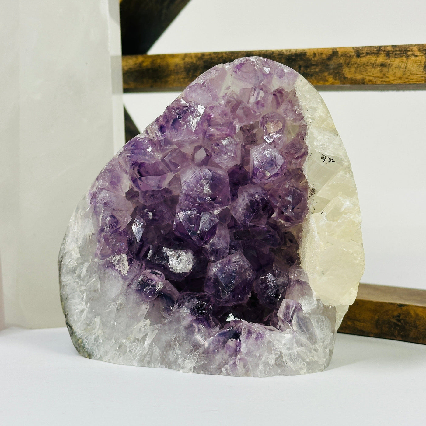 amethyst cut base with decorations in the background