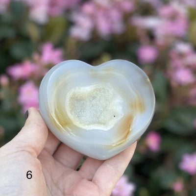 agate heart with decorations in the background