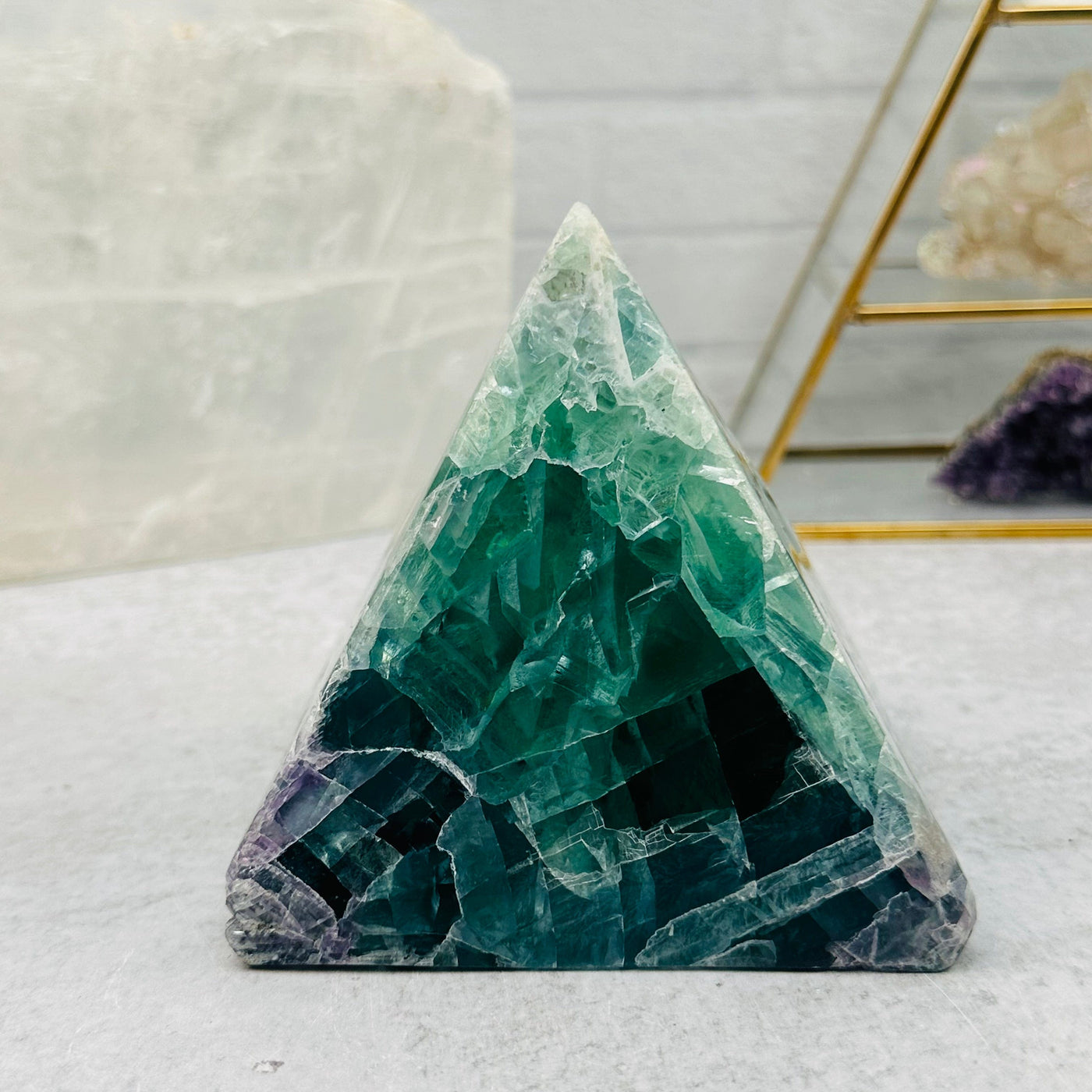 Large Rainbow Fluorite Pyramid Crystal displayed as home decor 