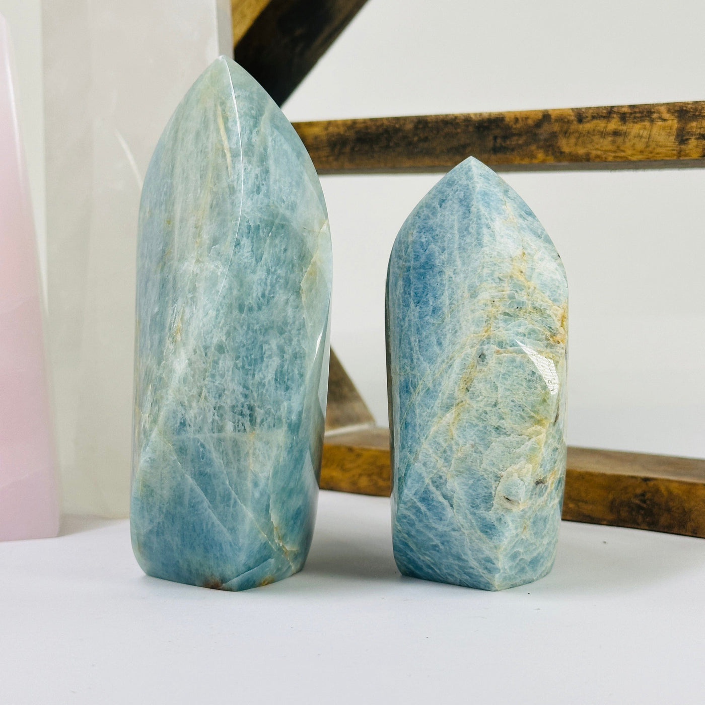 aquamarine points with decorations in the background