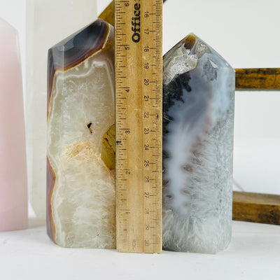 agate point next to a ruler for size reference