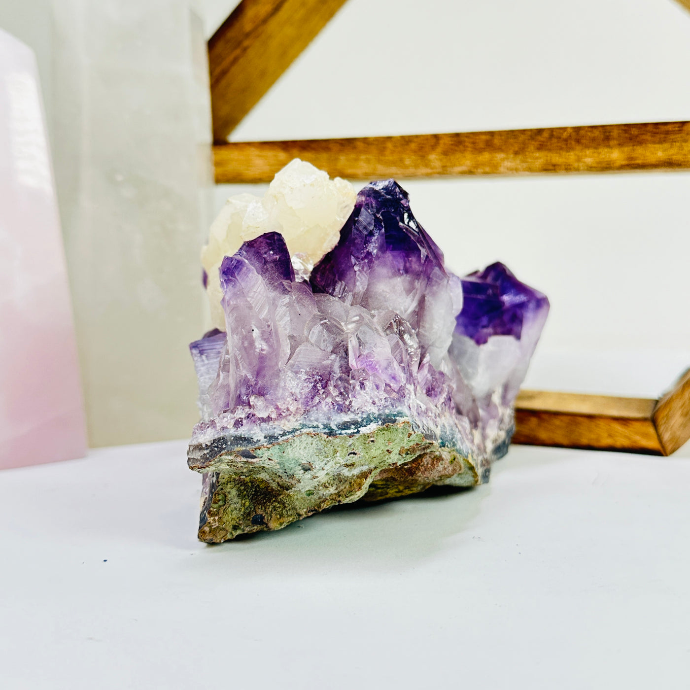 amethyst cut base with decorations in the background