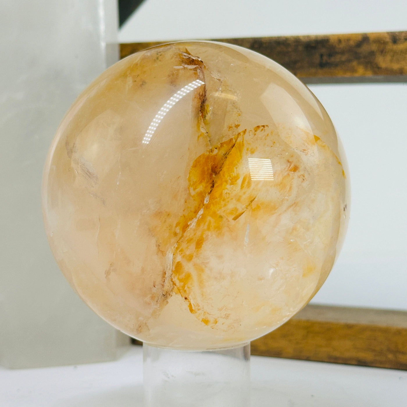 golden healer sphere with decorations in the background