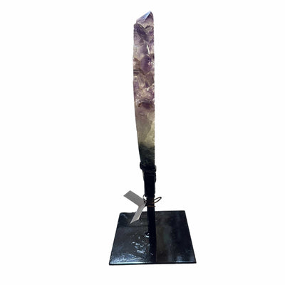 amethyst with jasper on metal stand on white background